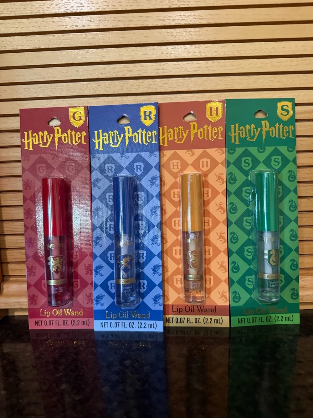 Warner Bros. Harry Potter Lip Oil Set — Red, Blue, Orange & Green Wands